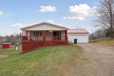 Welcome to 10291 Highland Green Drive, a 3-bedroom, 3-bath home on Lake LeAnn Golf Course in Michigan - for sale on GolfHomes.com, golf home, golf lot