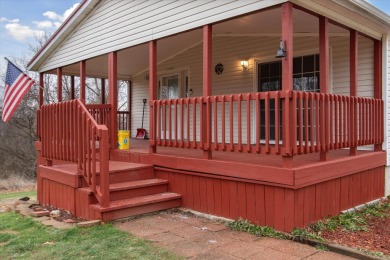 Welcome to 10291 Highland Green Drive, a 3-bedroom, 3-bath home on Lake LeAnn Golf Course in Michigan - for sale on GolfHomes.com, golf home, golf lot