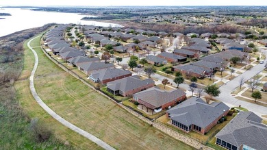 Located in the highly desirable Frisco Lakes 55+ community, this on Frisco Lakes Golf Course in Texas - for sale on GolfHomes.com, golf home, golf lot