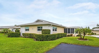 Beautifully updated villa-style condo in Palm Harbor's premier on Highland Lakes Executive Golf Course in Florida - for sale on GolfHomes.com, golf home, golf lot