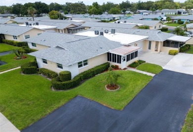 Beautifully updated villa-style condo in Palm Harbor's premier on Highland Lakes Executive Golf Course in Florida - for sale on GolfHomes.com, golf home, golf lot