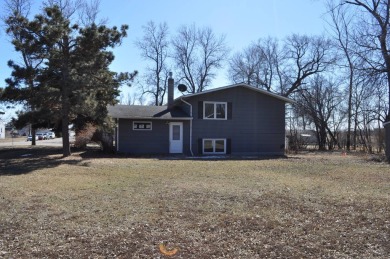 A well-kept split level home with 2 bedrooms on the main floor on Cooperstown Country Club in North Dakota - for sale on GolfHomes.com, golf home, golf lot