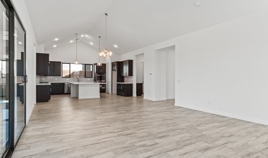 Expansive great room and dining area with optional vaulted on  in Arizona - for sale on GolfHomes.com, golf home, golf lot