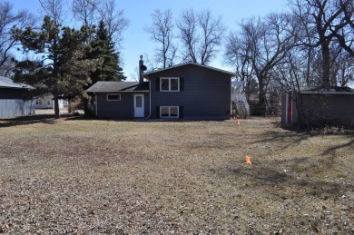 A well-kept split level home with 2 bedrooms on the main floor on Cooperstown Country Club in North Dakota - for sale on GolfHomes.com, golf home, golf lot