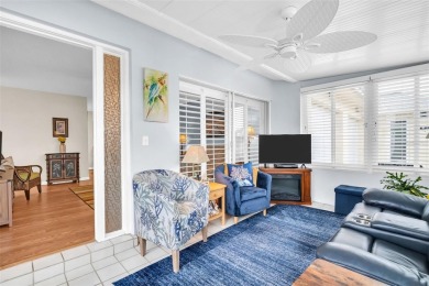 Beautifully updated villa-style condo in Palm Harbor's premier on Highland Lakes Executive Golf Course in Florida - for sale on GolfHomes.com, golf home, golf lot