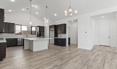 Expansive great room and dining area with optional vaulted on  in Arizona - for sale on GolfHomes.com, golf home, golf lot