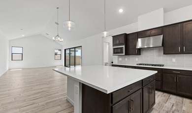 Expansive great room and dining area with optional vaulted on  in Arizona - for sale on GolfHomes.com, golf home, golf lot