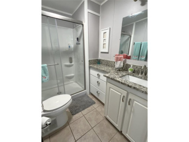 Under contract-accepting backup offers. No flooding! Stunning on Mangrove Bay Golf Course in Florida - for sale on GolfHomes.com, golf home, golf lot