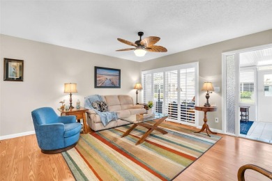 Beautifully updated villa-style condo in Palm Harbor's premier on Highland Lakes Executive Golf Course in Florida - for sale on GolfHomes.com, golf home, golf lot