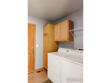 Golf Course Living in The Island at Coal Creek Ranch!Discover on Coal Creek Golf Course in Colorado - for sale on GolfHomes.com, golf home, golf lot