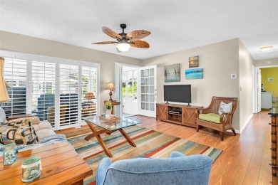 Beautifully updated villa-style condo in Palm Harbor's premier on Highland Lakes Executive Golf Course in Florida - for sale on GolfHomes.com, golf home, golf lot