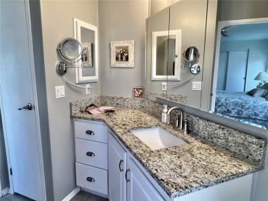Under contract-accepting backup offers. No flooding! Stunning on Mangrove Bay Golf Course in Florida - for sale on GolfHomes.com, golf home, golf lot