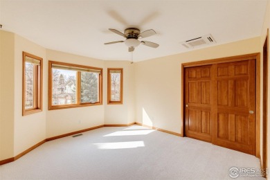 Golf Course Living in The Island at Coal Creek Ranch!Discover on Coal Creek Golf Course in Colorado - for sale on GolfHomes.com, golf home, golf lot