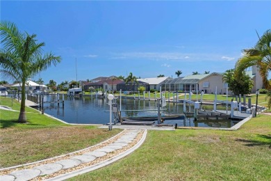 WATERFRONT HOME IN PGI W/**NEW TILE ROOF** & QUICK SAIL ACCESS on Saint Andrews South Golf Club in Florida - for sale on GolfHomes.com, golf home, golf lot