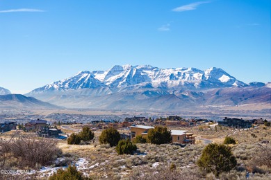 Boasting expansive views of Mt. Timpanogos and the Wasatch Back on Red Ledges Golf Club in Utah - for sale on GolfHomes.com, golf home, golf lot