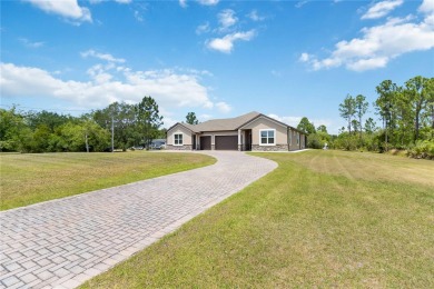 Beautiful Custom Home w/Separate Mother In Law unit!!! Welcome on Wedgefield Golf Club in Florida - for sale on GolfHomes.com, golf home, golf lot