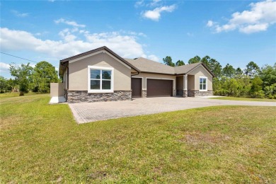 Beautiful Custom Home w/Separate Mother In Law unit!!! Welcome on Wedgefield Golf Club in Florida - for sale on GolfHomes.com, golf home, golf lot