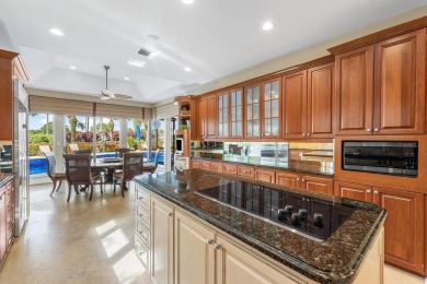 Welcome to this high-end, meticulously maintained 4-bedroom plus on Bocaire Country Club in Florida - for sale on GolfHomes.com, golf home, golf lot