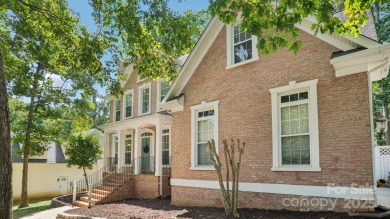 Welcome home to this beautiful brick residence in desirable on The Divide Golf Club in North Carolina - for sale on GolfHomes.com, golf home, golf lot