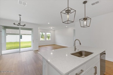 Brand new, energy-efficient home available NOW! The Corsica on LPGA International Golf Course in Florida - for sale on GolfHomes.com, golf home, golf lot