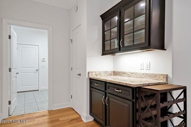 Quality & style combine with this home in Brunswick Forest. This on Cape Fear National At Brunswick Forest in North Carolina - for sale on GolfHomes.com, golf home, golf lot