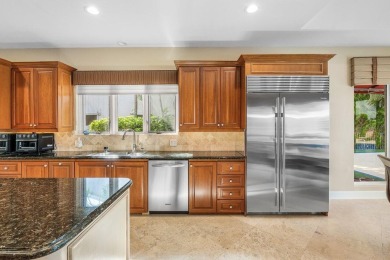 Welcome to this high-end, meticulously maintained 4-bedroom plus on Bocaire Country Club in Florida - for sale on GolfHomes.com, golf home, golf lot