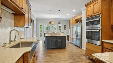 Welcome home to this beautiful brick residence in desirable on The Divide Golf Club in North Carolina - for sale on GolfHomes.com, golf home, golf lot