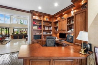 Welcome to this high-end, meticulously maintained 4-bedroom plus on Bocaire Country Club in Florida - for sale on GolfHomes.com, golf home, golf lot