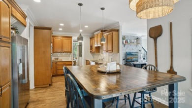 Welcome home to this beautiful brick residence in desirable on The Divide Golf Club in North Carolina - for sale on GolfHomes.com, golf home, golf lot