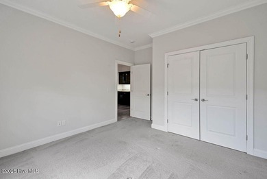 Quality & style combine with this home in Brunswick Forest. This on Cape Fear National At Brunswick Forest in North Carolina - for sale on GolfHomes.com, golf home, golf lot