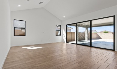 Expansive great room and dining area with optional vaulted on Verrado Golf Club - Victory in Arizona - for sale on GolfHomes.com, golf home, golf lot