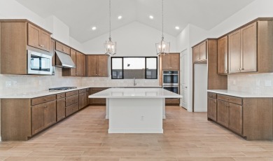Expansive great room and dining area with optional vaulted on Verrado Golf Club - Victory in Arizona - for sale on GolfHomes.com, golf home, golf lot