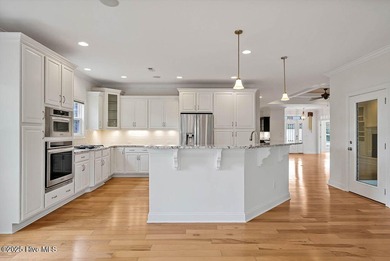 Quality & style combine with this home in Brunswick Forest. This on Cape Fear National At Brunswick Forest in North Carolina - for sale on GolfHomes.com, golf home, golf lot