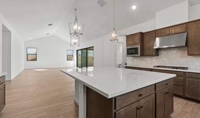Expansive great room and dining area with optional vaulted on Verrado Golf Club - Victory in Arizona - for sale on GolfHomes.com, golf home, golf lot