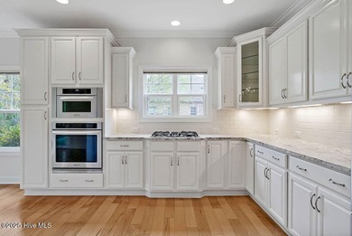 Quality & style combine with this home in Brunswick Forest. This on Cape Fear National At Brunswick Forest in North Carolina - for sale on GolfHomes.com, golf home, golf lot