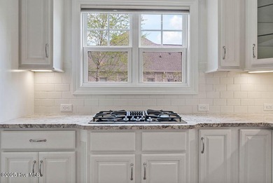 Quality & style combine with this home in Brunswick Forest. This on Cape Fear National At Brunswick Forest in North Carolina - for sale on GolfHomes.com, golf home, golf lot