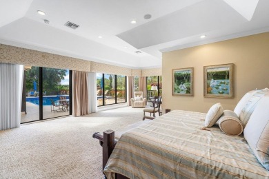 Welcome to this high-end, meticulously maintained 4-bedroom plus on Bocaire Country Club in Florida - for sale on GolfHomes.com, golf home, golf lot