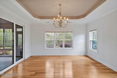 Quality & style combine with this home in Brunswick Forest. This on Cape Fear National At Brunswick Forest in North Carolina - for sale on GolfHomes.com, golf home, golf lot