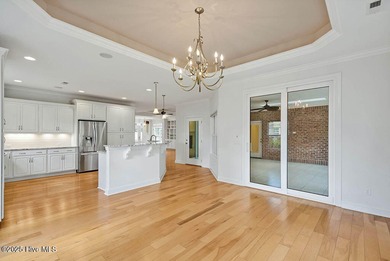 Quality & style combine with this home in Brunswick Forest. This on Cape Fear National At Brunswick Forest in North Carolina - for sale on GolfHomes.com, golf home, golf lot