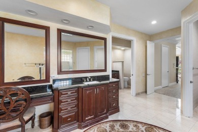 Welcome to this high-end, meticulously maintained 4-bedroom plus on Bocaire Country Club in Florida - for sale on GolfHomes.com, golf home, golf lot