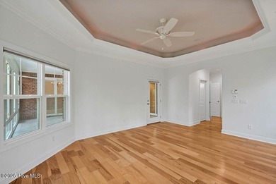 Quality & style combine with this home in Brunswick Forest. This on Cape Fear National At Brunswick Forest in North Carolina - for sale on GolfHomes.com, golf home, golf lot