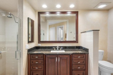 Welcome to this high-end, meticulously maintained 4-bedroom plus on Bocaire Country Club in Florida - for sale on GolfHomes.com, golf home, golf lot