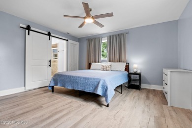 Discover the dream of islander living in this splendid home on Founders Club At St. James Plantation in North Carolina - for sale on GolfHomes.com, golf home, golf lot