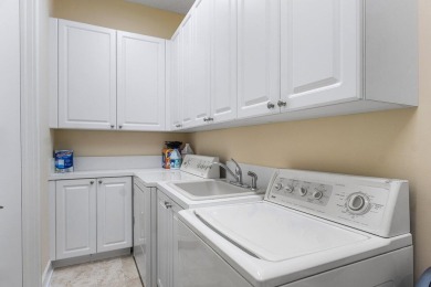 Welcome to this high-end, meticulously maintained 4-bedroom plus on Bocaire Country Club in Florida - for sale on GolfHomes.com, golf home, golf lot