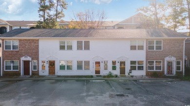 Welcome to your cozy coastal retreat! This charming two-bedroom on Cane Patch Driving Range in South Carolina - for sale on GolfHomes.com, golf home, golf lot