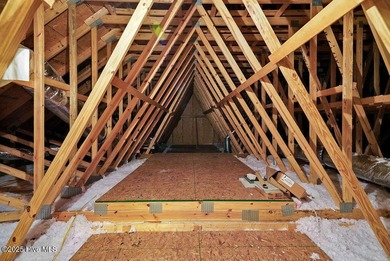 Quality & style combine with this home in Brunswick Forest. This on Cape Fear National At Brunswick Forest in North Carolina - for sale on GolfHomes.com, golf home, golf lot