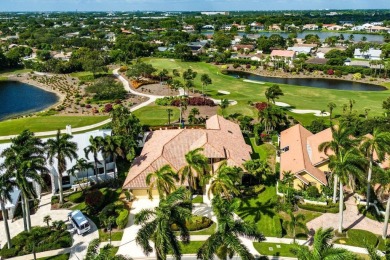 Welcome to this high-end, meticulously maintained 4-bedroom plus on Bocaire Country Club in Florida - for sale on GolfHomes.com, golf home, golf lot