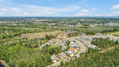 Quality & style combine with this home in Brunswick Forest. This on Cape Fear National At Brunswick Forest in North Carolina - for sale on GolfHomes.com, golf home, golf lot