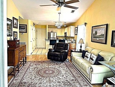 This corner unit golf course condo is tucked away in a serene on True Blue Plantation in South Carolina - for sale on GolfHomes.com, golf home, golf lot