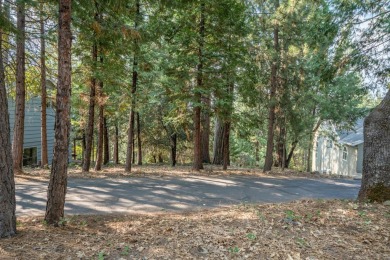 Serene forest view lot in the highly desirable gated community on Forest Meadows Golf Course in California - for sale on GolfHomes.com, golf home, golf lot